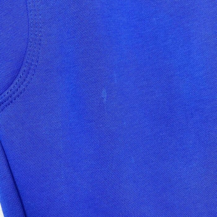 Close-up of Details on Blue Joggers