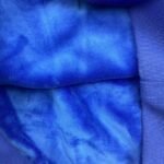 Close-up of Details on Blue Drama Call Hoodie
